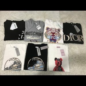 Designer T-Shirts never worn before comes with tags.